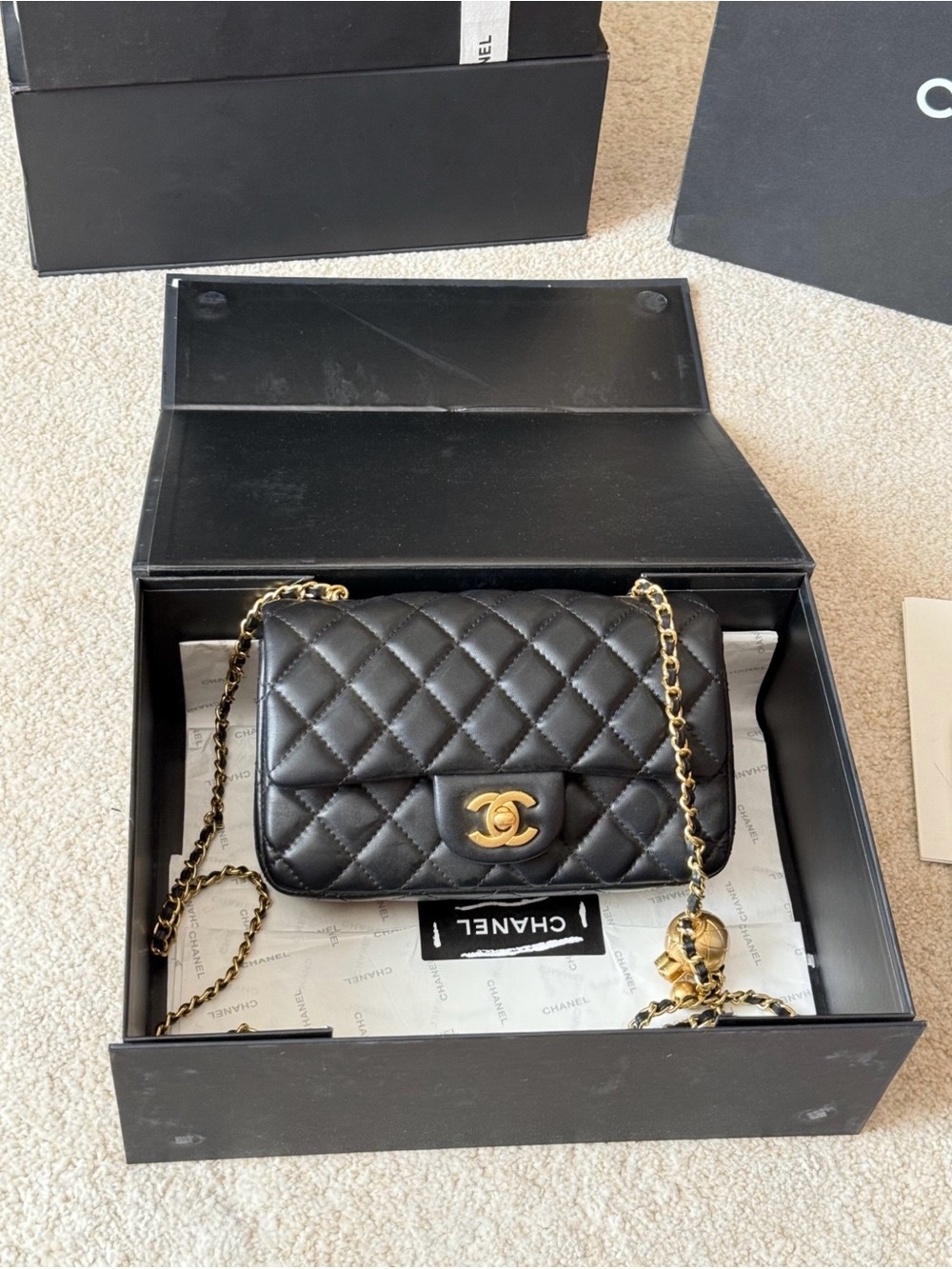 CHANEL Black Quilted Lambskin Mini Flap Bag with Gold Hardware